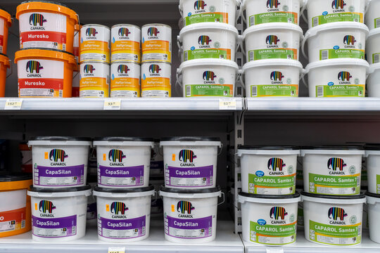 Caparol brand paints on store shelves. Minsk, Belarus, 2022