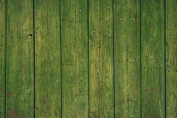 Fototapeta na wymiar Rustic Brown Weathered Wood Grain wood planks background blue-green painted old texture vintage knots and nail holes Rustic Weathered, flaked paint exfoliate Fence beautiful