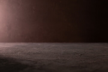 Stone table top abstract background near concrete wall