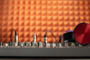 Closeup of sound mixer audio mixing console. Music concept in sound recording studio