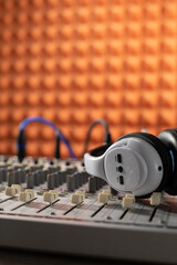Headphones and sound mixer radio station. Music concept sound record studio