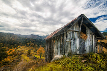 Wooden farm house on the mountains cloudy grey sky in autumn Duzce Turkey
