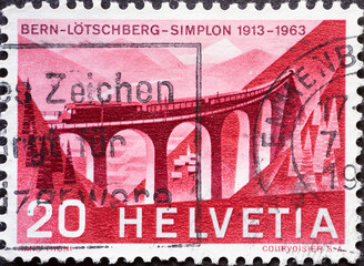 SWITZERLAND - CIRCA 1963: a postage stamp from Switzerland, showing the historic Luegelkinn Viaduct with railway. Bern, Lötschberg, Simplon- Circa 1963