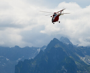 helicopter topr over the Tatra Mountains - obrazy, fototapety, plakaty