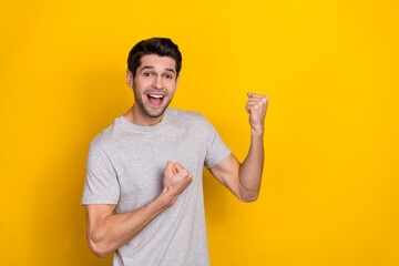 Photo of cute brunet millennial guy yell wear trend cloth isolated on yellow color background