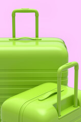 Colorful suitcase on monochrome pink background. 3D render of summer concept