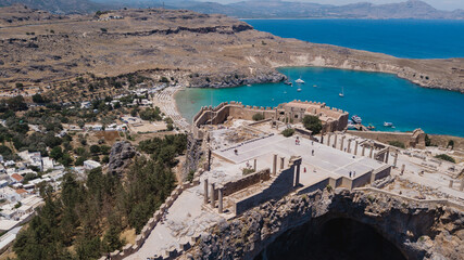 Aerial view of Lindos Acropolis, in Rhodes Island, Greece, with Lindos Beach in the background