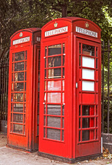 photograph of a red telephone booth in London