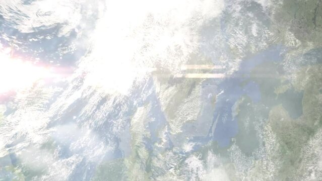 Earth zoom in from outer space to city. Zooming on Uddevalla, Sweden. The animation continues by zoom out through clouds and atmosphere into space. Images from NASA