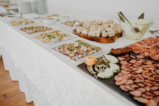 Set of different dishes and entres on an event table