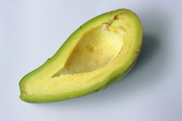 Fresh tropical avacado fruit over white background