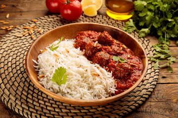 DAWOOD BASHA or meatballs with rice served in a dish isolated on wooden background side view of arabic food - obrazy, fototapety, plakaty
