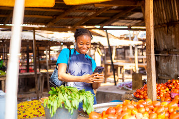 market woman using phone