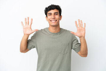 Naklejka premium Young Argentinian man isolated on white background counting ten with fingers