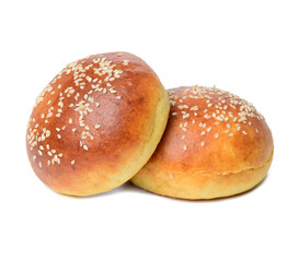 Whole round bun made of white wheat flour with sesame seeds isolated on white background
