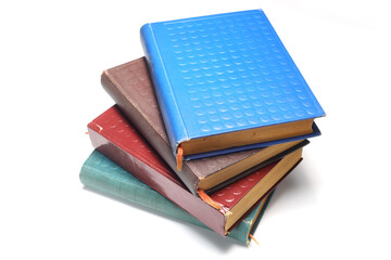 pile of books isolated on white background