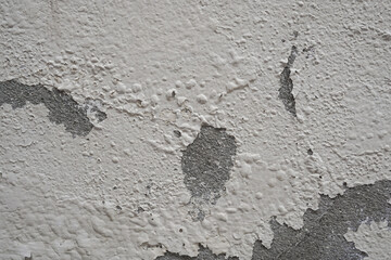 Old wall with cement surface crack. Wall color paint surface  crack. Old cement wall abstract background.