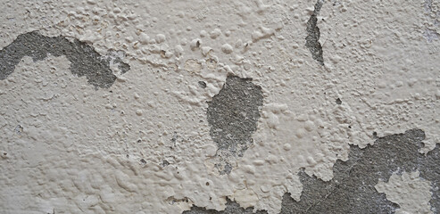 Old wall with cement surface crack. Wall color paint surface  crack. Old cement wall abstract background.