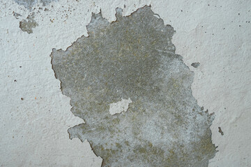 Old wall with cement surface crack. Wall color paint surface  crack. Old cement wall abstract background.