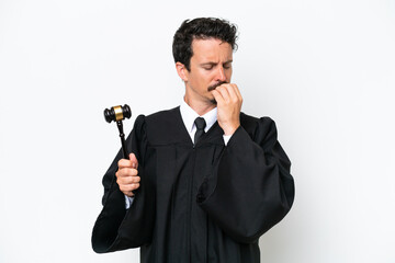 Young judge caucasian man isolated on white background having doubts
