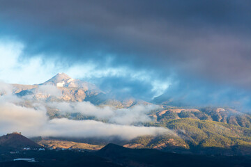 Cloudy panoramic view on Tenerife island with peak of Mount Teide, volcatic landscape, Canary islands, Spain