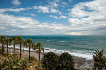 Fototapeta premium View on beach and coastline in Torrox Costa, Costa del Sol, small touristic town between Malaga and Nerja, Andalusia, Spain