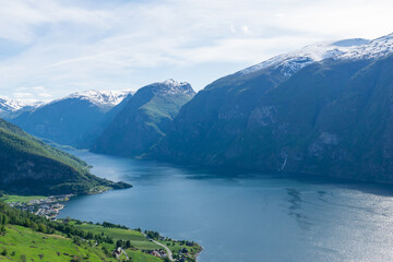 Fototapeta na wymiar Impressive Naeroyfjord surrounded by high mountains in Norway