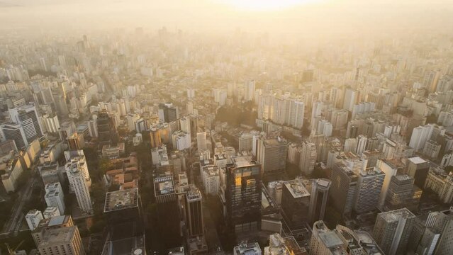 Aerial view of the city of Sao Paulo, Brazil at sunset. Cinematic 4K