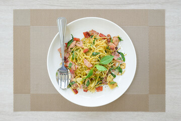 Stir-fried spaghetti with bacon and dried chili