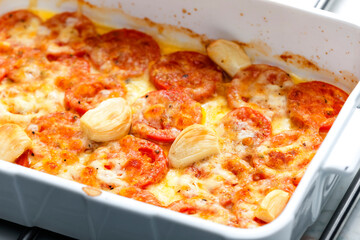 baked tomatoes with cheese and garlic