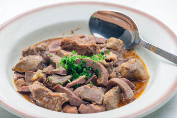 stew of meat, livers and kidneys