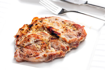 pork cutlet on white plate