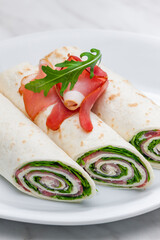 wraps filled with letuce and schwarzwald ham