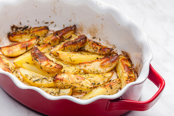still life of baked potatoes with herbs