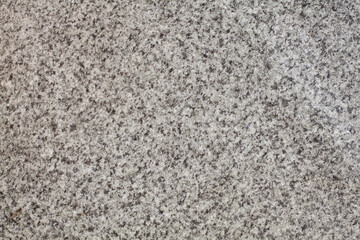 Dirty rough surface texture of sand screed cement, old gray concrete wall for background with uneven stains and tiny holes.