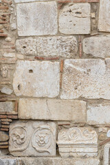 old wall of old Romanesque blocks as a background, Benevento, Campania, Italy