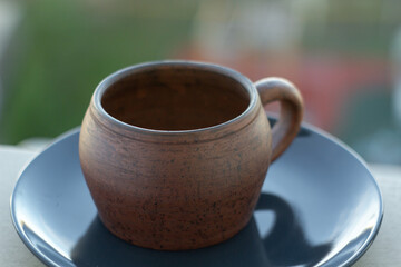      Ceramics, a ceramic product made with your own hands, made on a potter's wheel, a jug, a mug, clay. 