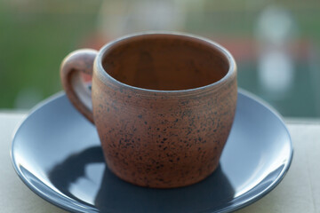      Ceramics, a ceramic product made with your own hands, made on a potter's wheel, a jug, a mug, clay. 