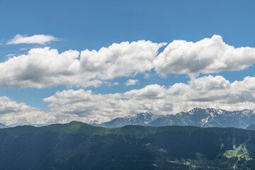 Beautiful  mountain landscape. High snow covered mountains in the fog .