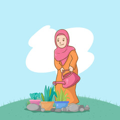 girl in hijab watering flowers