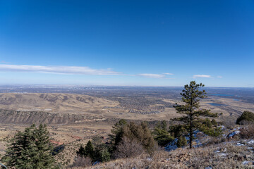 The view of Downtown Denver and Red Rocks Amphitheater from Mount Morrison in Denver, Colorado