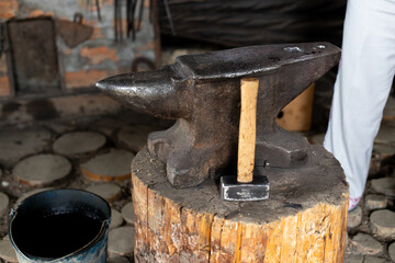 anvil and hammer in the forge