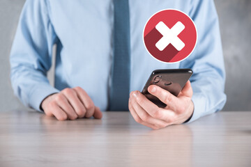Hand holds icon,cancellation symbol,cancel icon.Cross mark flat red icon.round X mark.cancel...