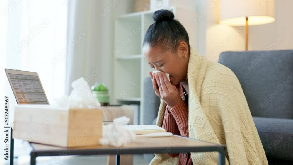 Poster Sick business woman with the flu, blowing her nose while working from home. A young female, ill with a cold, struggling to work remotely. Feeling unwell and under the weather, quarantined with covid