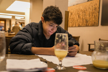 man drinking wine in the restaurant