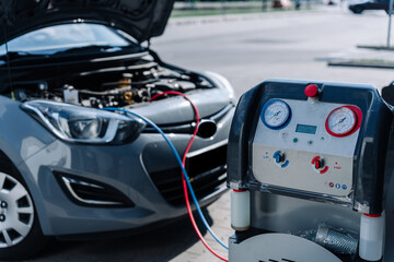 Car air condition ac repair service. Refill automobile ac compressor and checking auto conditioning...