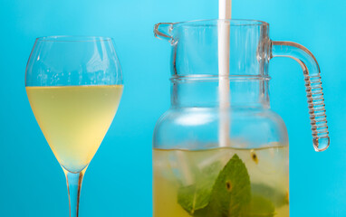 Passion Fruit and Peppermint Sangria with a Light Blue Background.