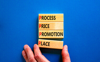 PPPP process price promotion place symbol. Concept words PPPP process price promotion place on wooden blocks on beautiful blue background. Business and PPPP process price promotion place concept.