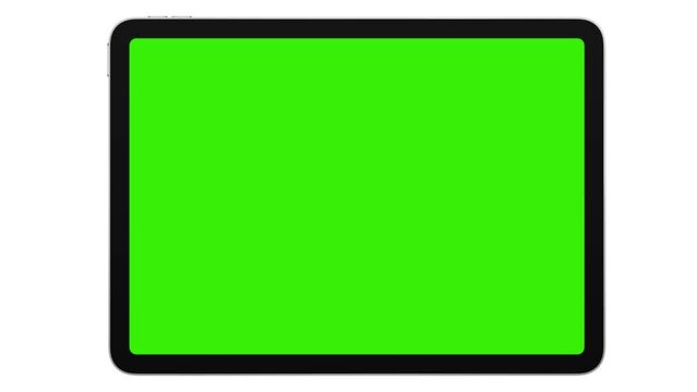 Tablet Computer With Rotation Green Screen and Motion Zoom Effect Isolated on White Background