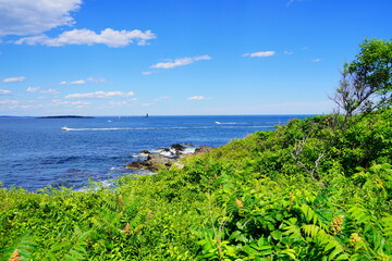 Fototapeta na wymiar Atlantic ocean waves and rock beach along coastline in Portland, Maine, USA 